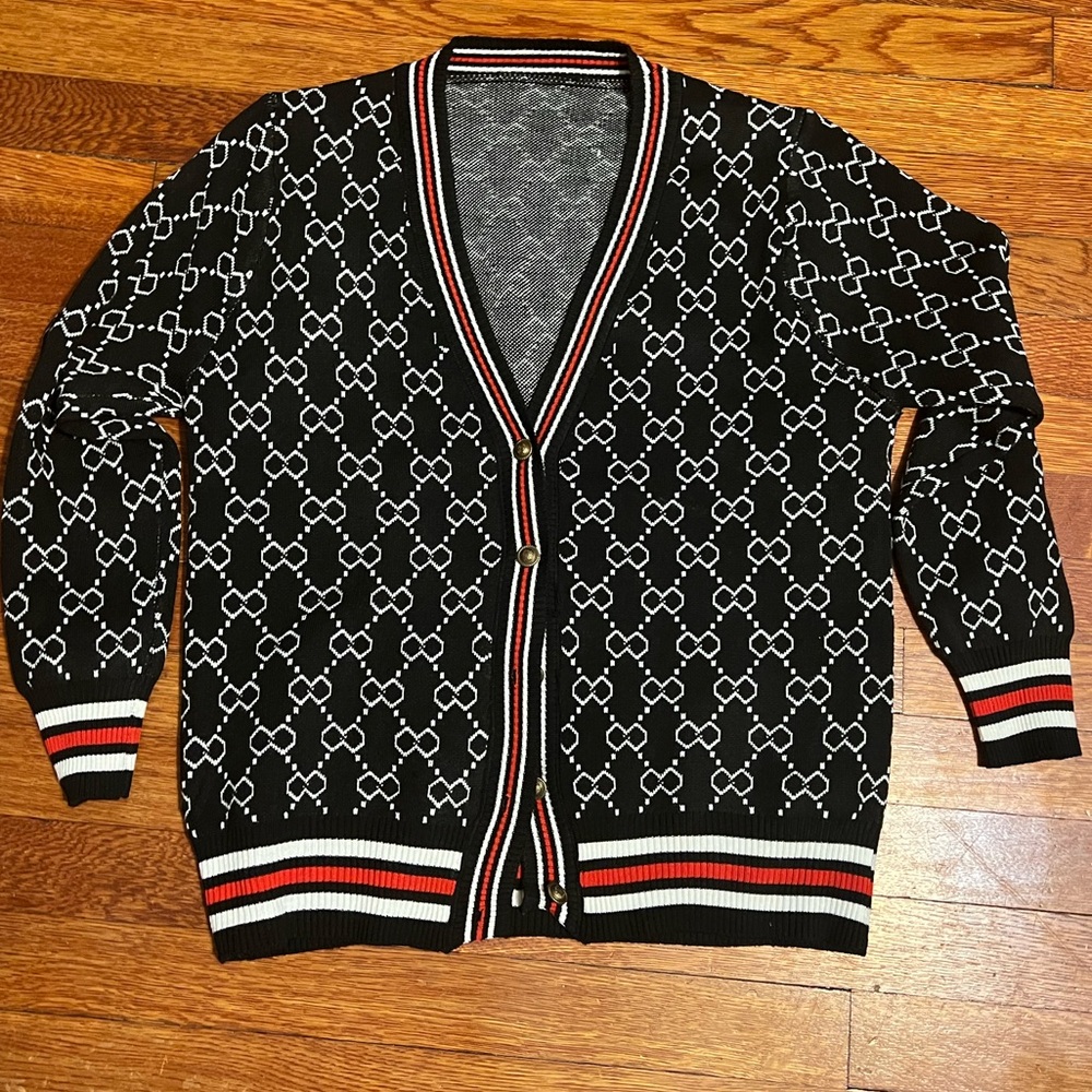 Black, white, red cardigan sweater